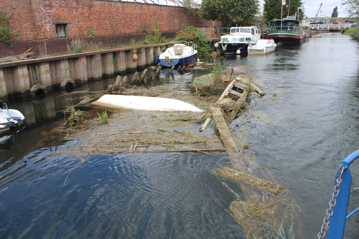 An upside down wreck on a river near Beverley